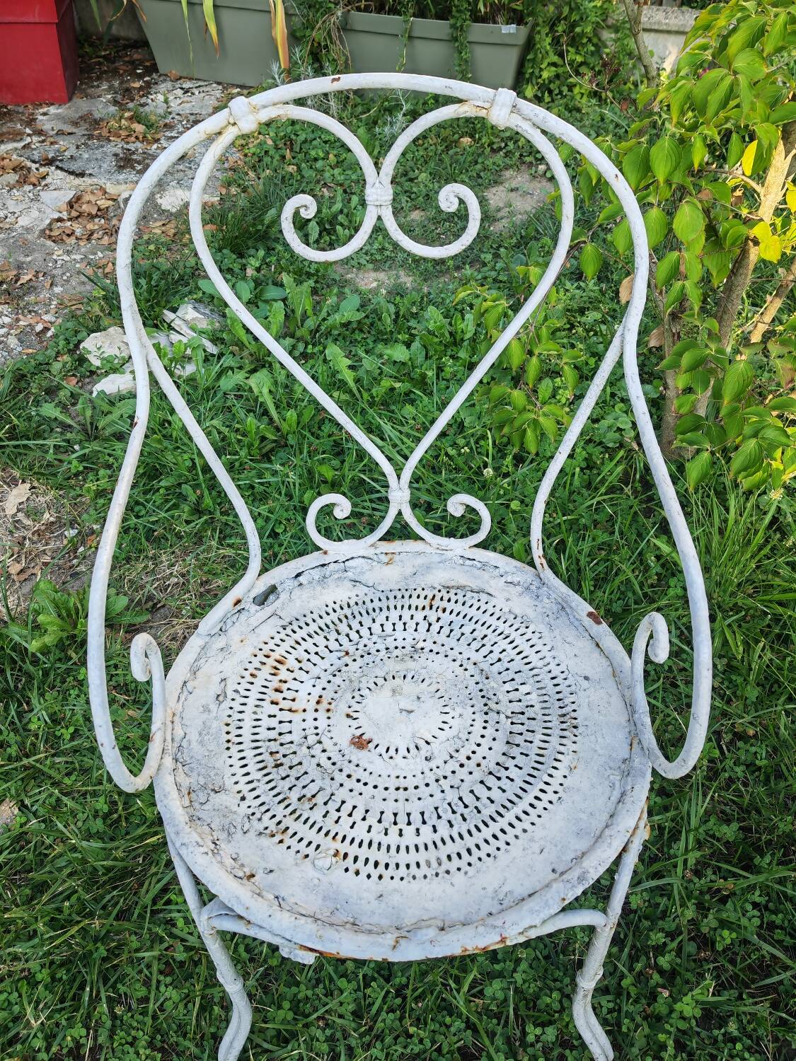 2 antique wrought iron armchairs