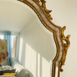 Large golden mirror parecloses