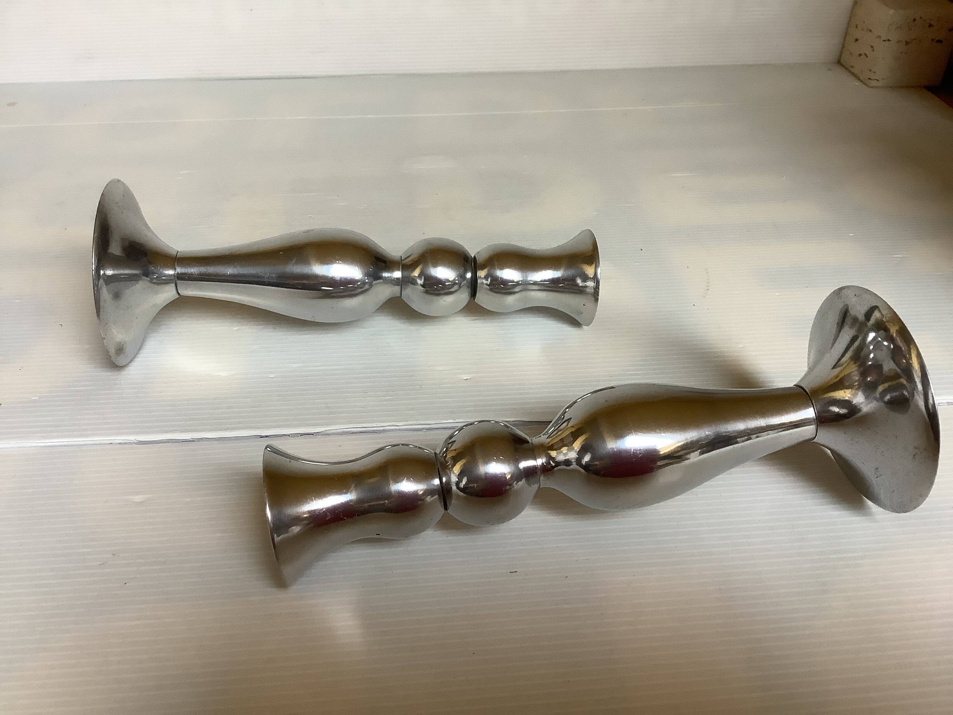 Pair of silver metal candlesticks