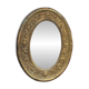 A. Arens, Antwerp, important oval mirror in repoussé brass with numerous animal decorations