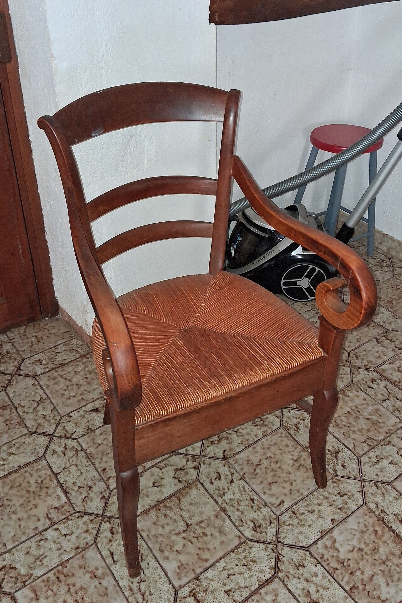 Empire armchair in solid walnut, early 19th century