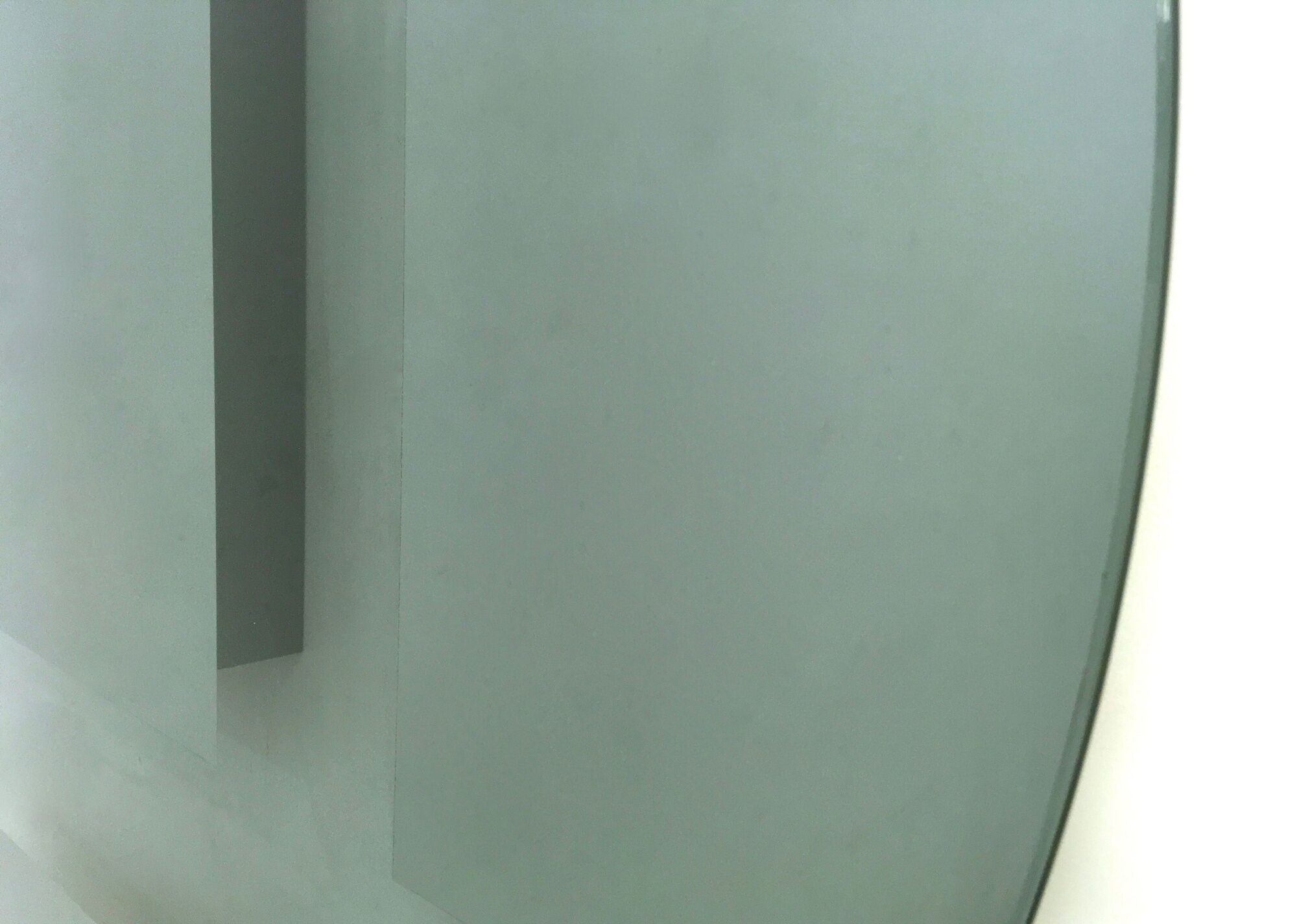 Postmodern round green-gray wall mirror "Andromeda" by Nanda Vigo, Italy 1976