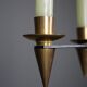 Candle holder in black metal and brass