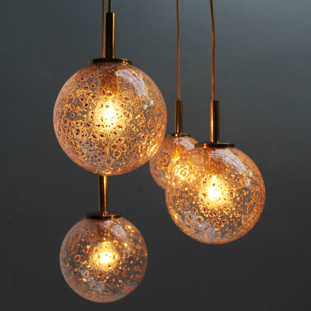 Four gold fleck globe pendants by Doria Germany