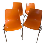 Set of four orange chairs