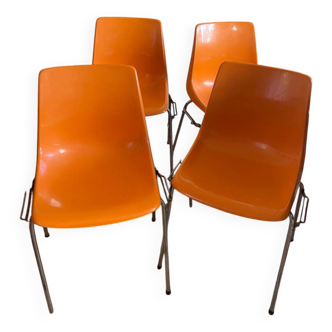 Set of four orange chairs