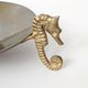 Vintage round brass tray on seahorse feet