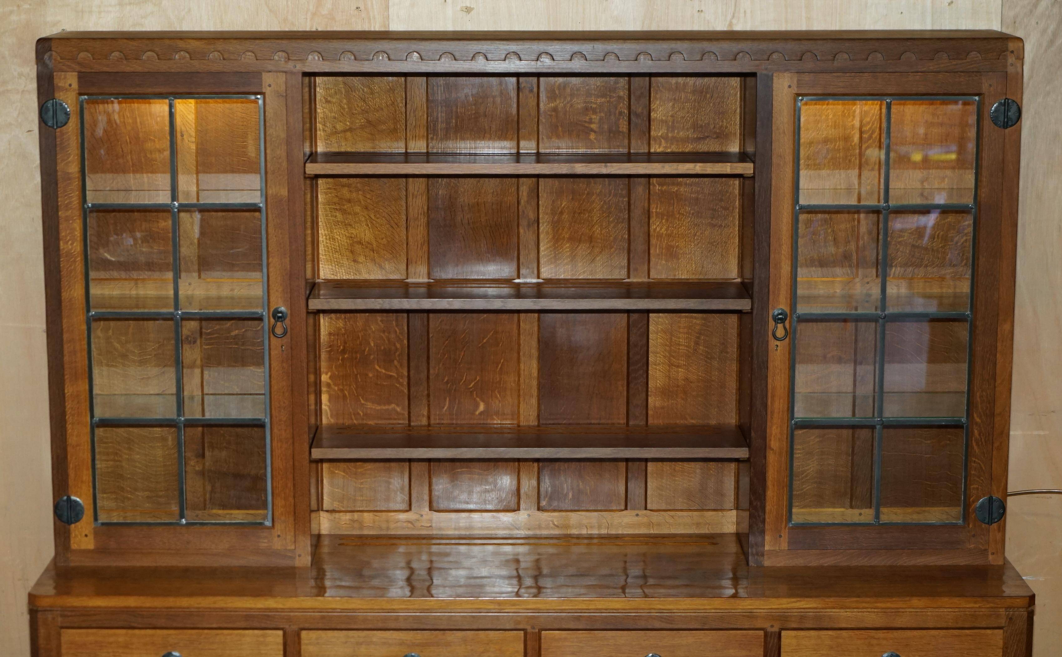 Vintage Robert Mouseman Thompson oak display cabinet with shelves and lighting.