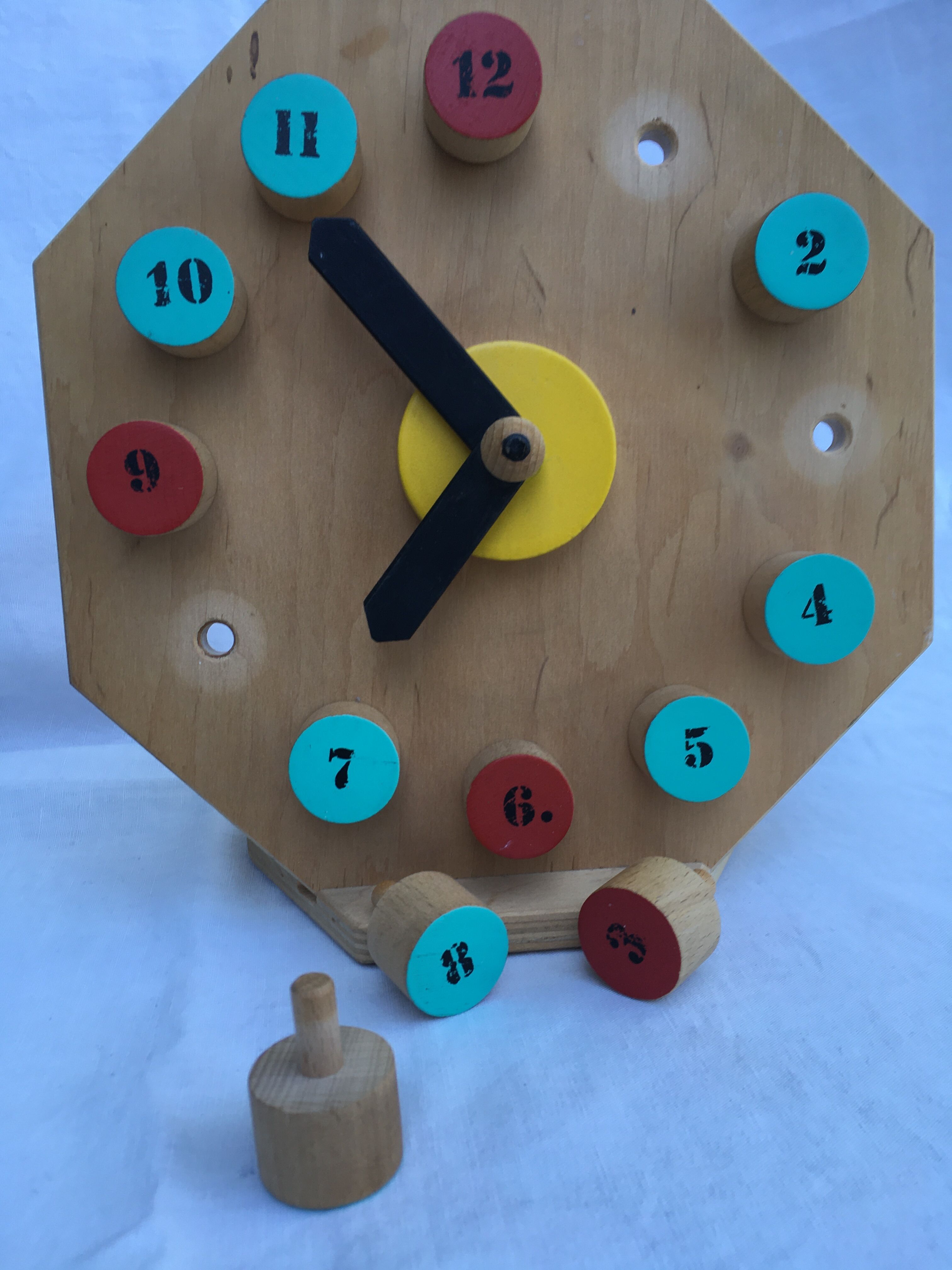 Painted wooden toy clock