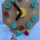 Painted wooden toy clock