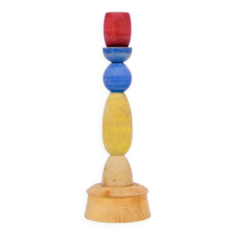 multi colored wooden candlestick