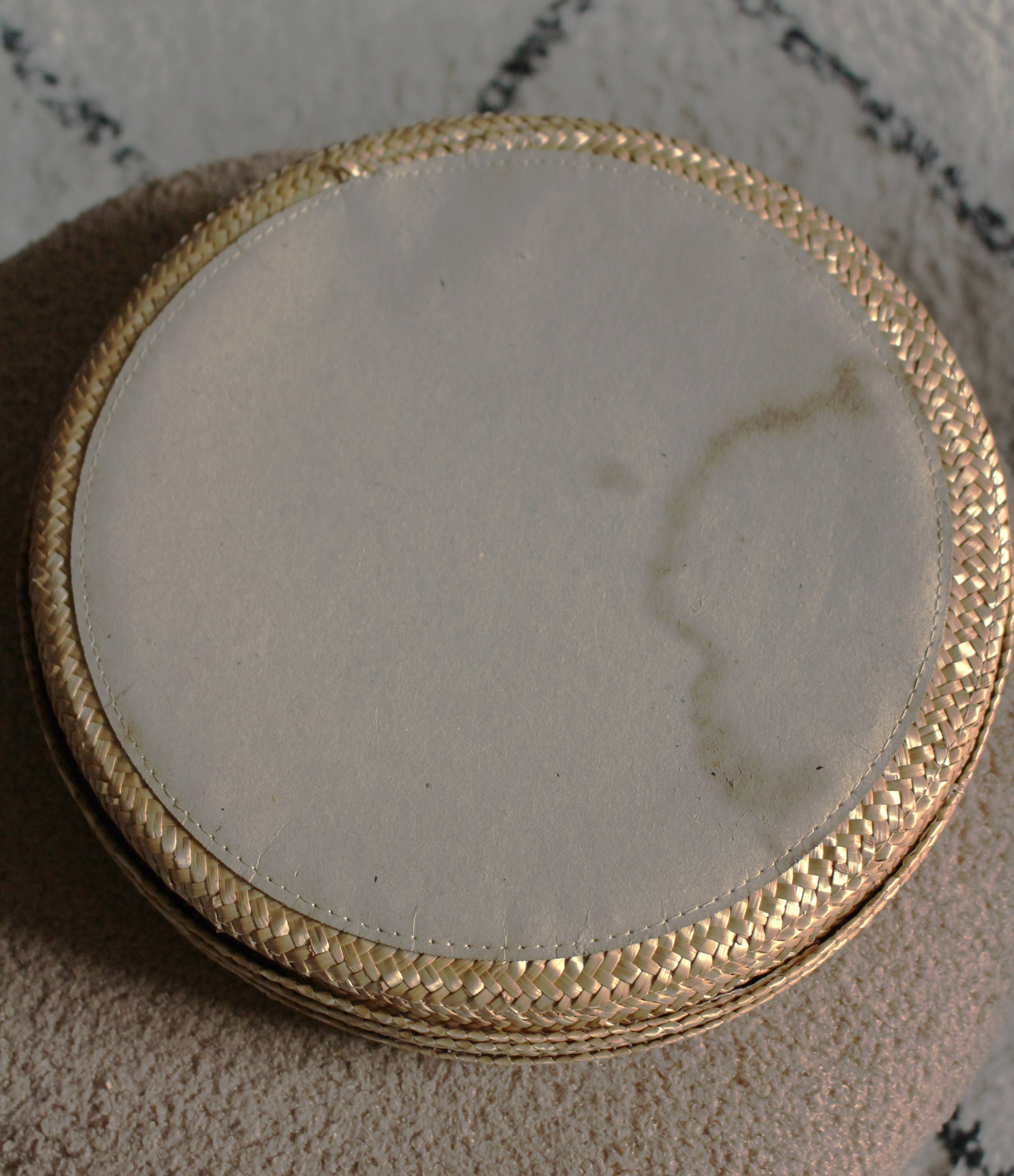 Round wicker basket with lid, vintage soft weaving.