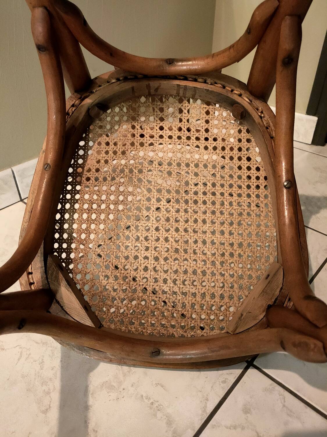Old bistro chair with caned seat