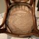 Old bistro chair with caned seat
