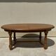 Oak dining table, oval living room table with two extensions.
