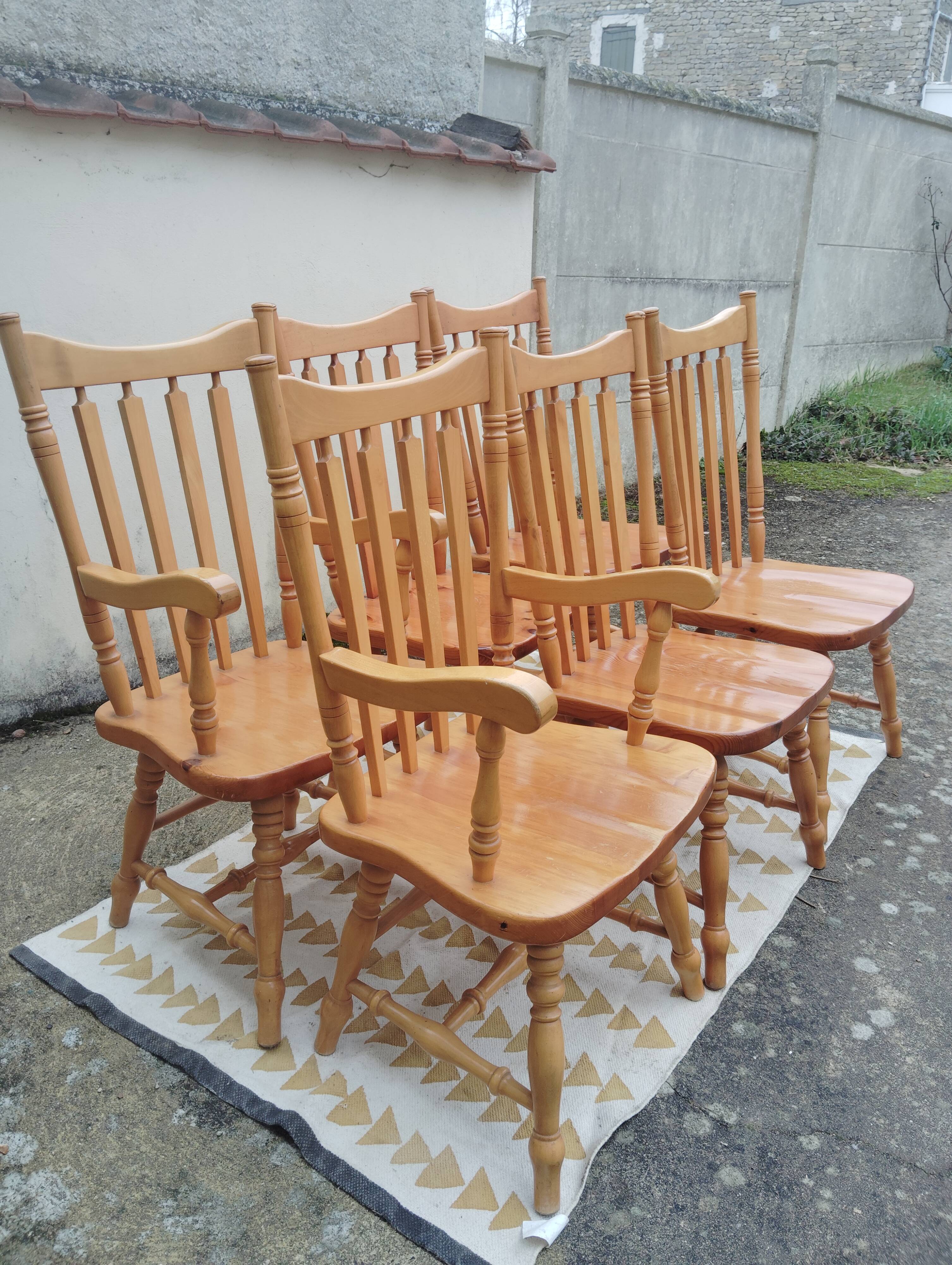 Set of 6 western bistro chairs, including 2 with armrests.