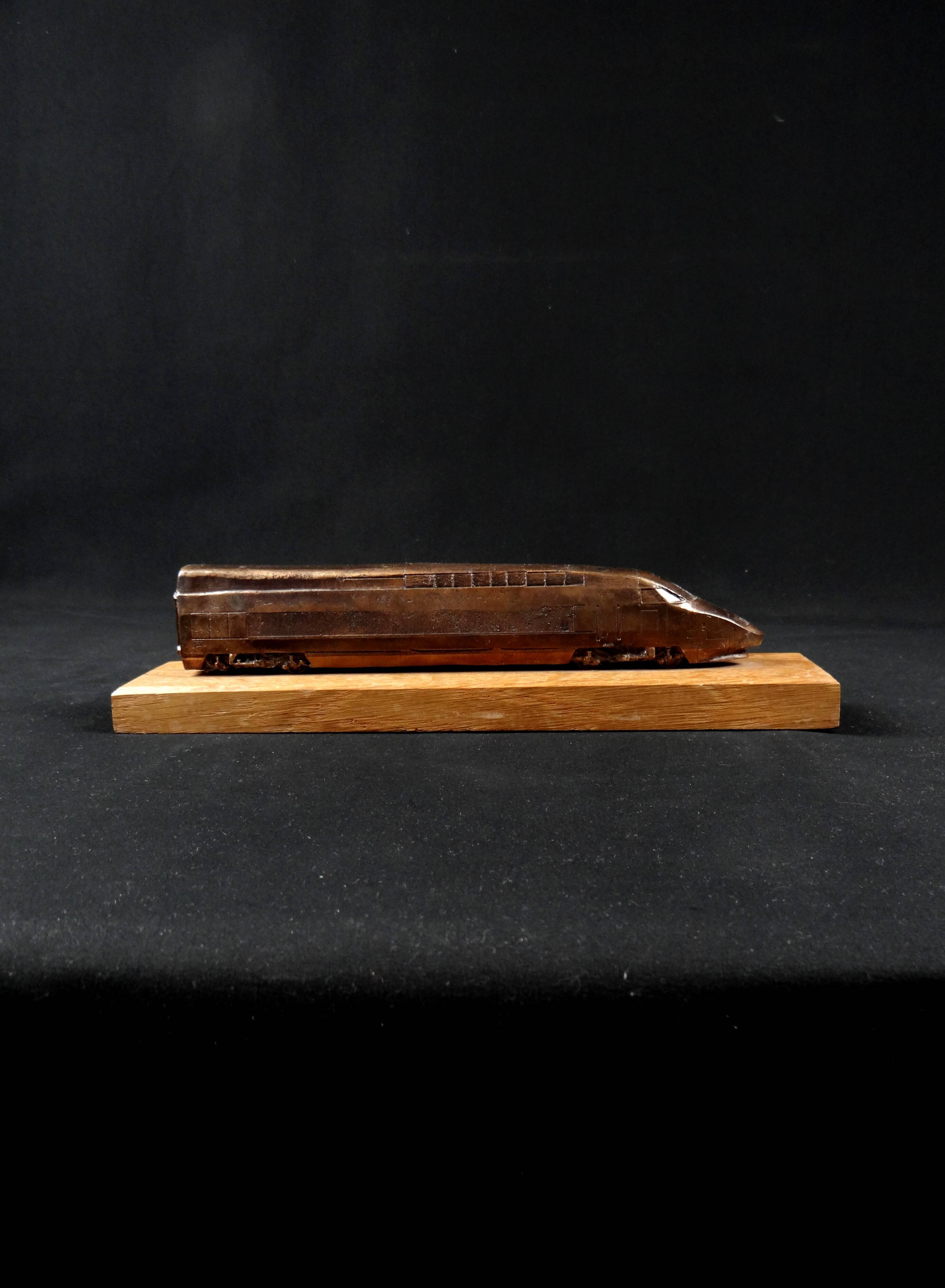 Bronze TGV on a wooden base, scale model of the TGV Sud-Est from the 1980s