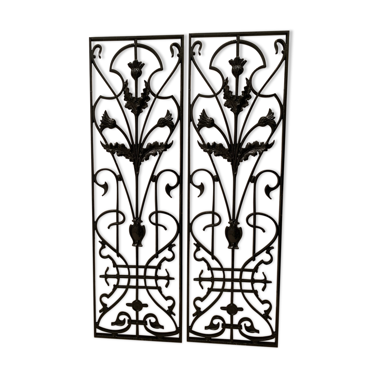 2 Art Nouveau ironwork grids decorated with inopuly or blueberry decoration