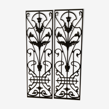 2 Art Nouveau ironwork grids decorated with inopuly or blueberry decoration