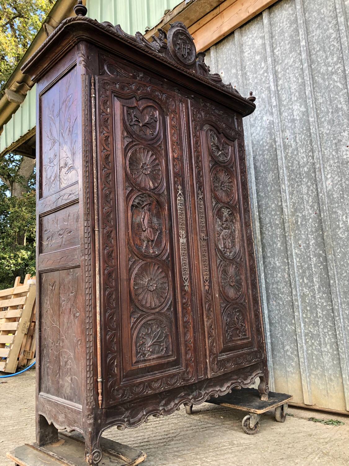 Antique Breton oak cabinet, richly carved