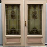 Wooden doors with stained glass