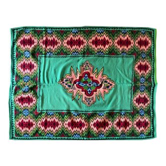 Romanian flatwoven rug geometrical design on a green turquoise background, 158x185 cm