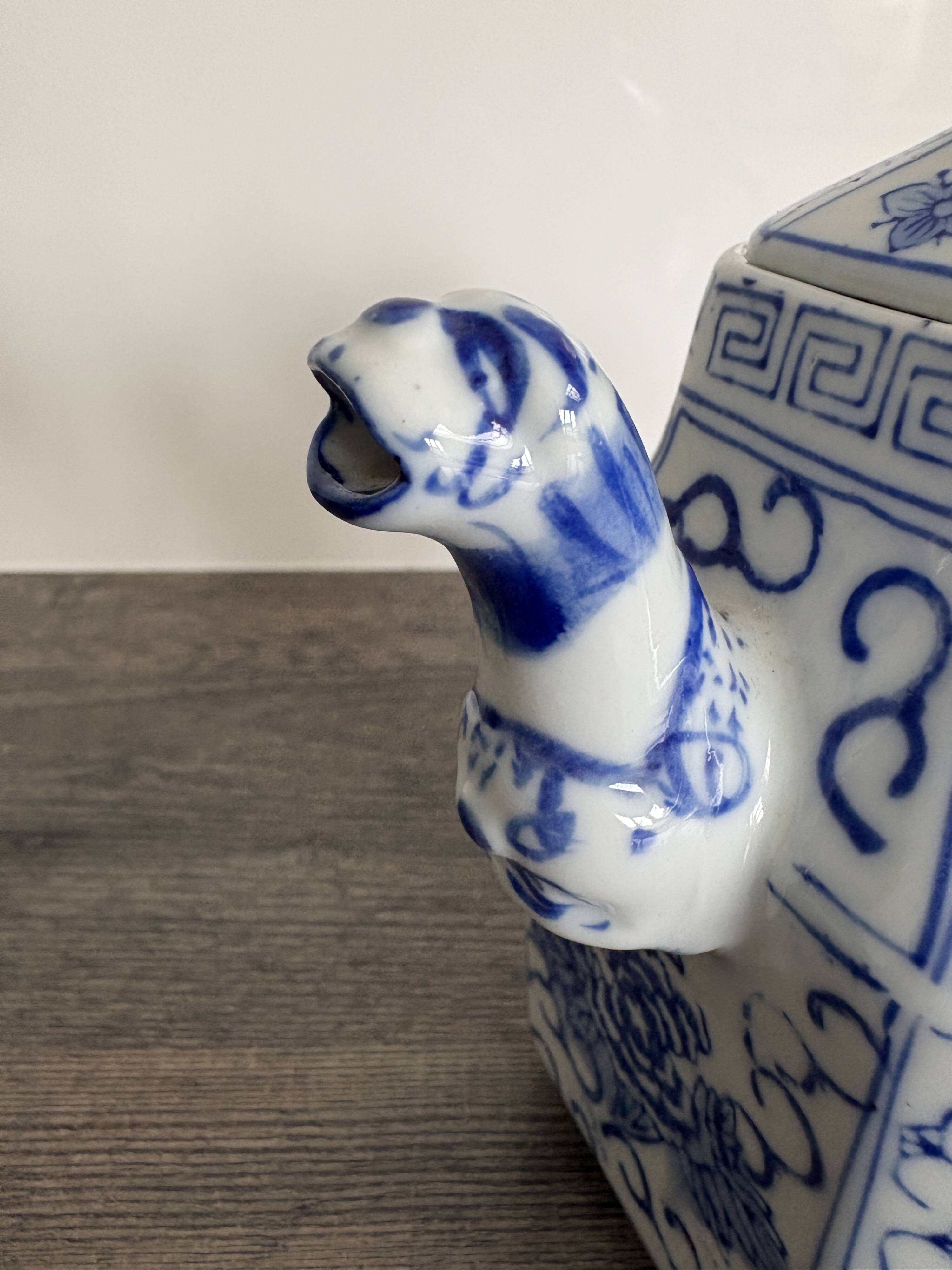 Antique Chinese tea set decorated with dragons.