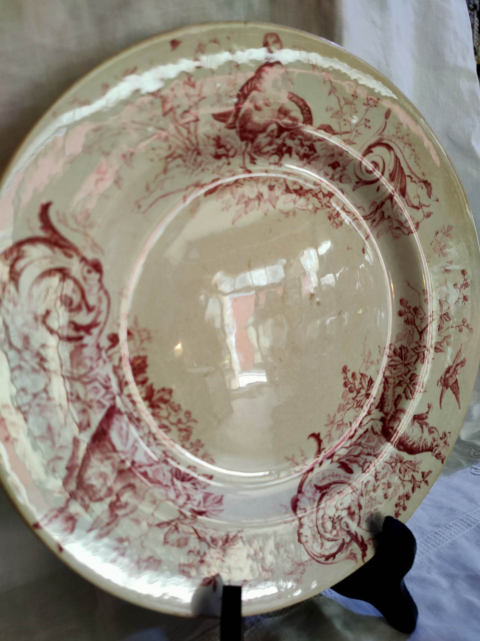 Assiette plate terre de fer faïence de Lunéville K/G