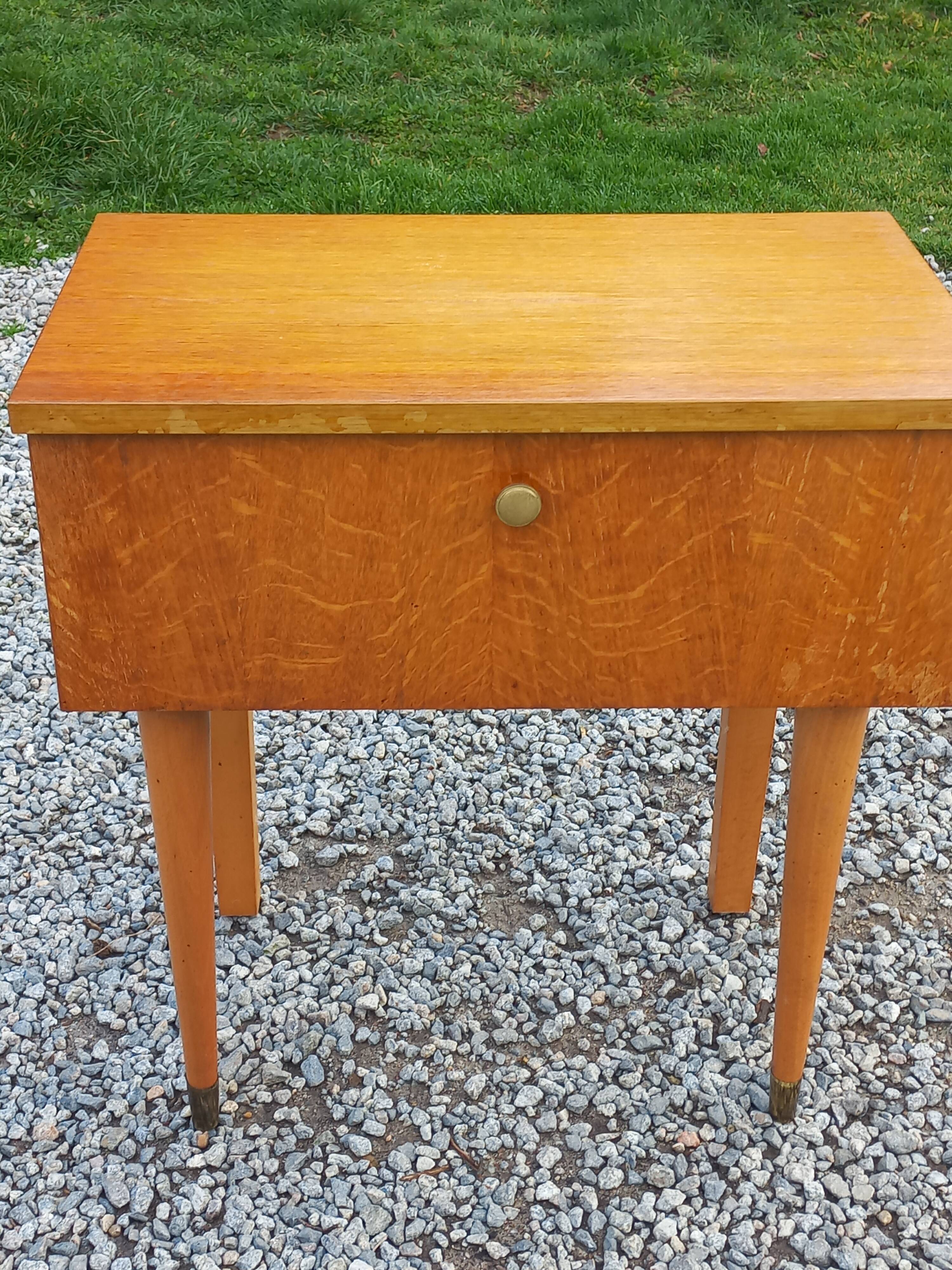 Vintage 1950s bedside table in blond oak with conical legs