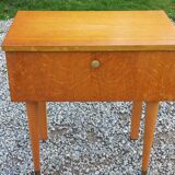 Vintage 1950s bedside table in blond oak with conical legs