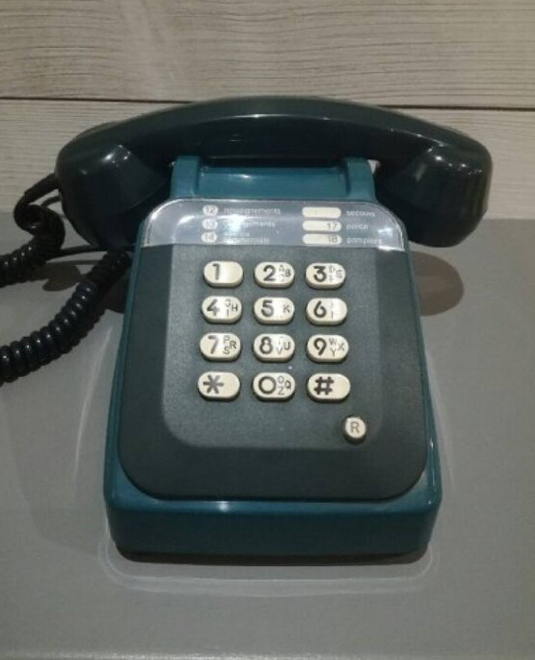 Blue button telephone