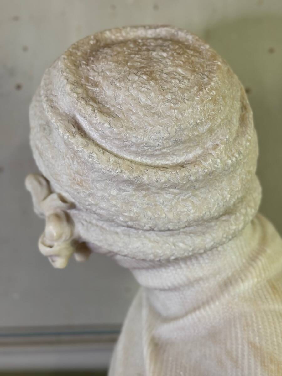 Alabaster bust of a young girl with a turtleneck, signed Caloni, Italy circa 1900