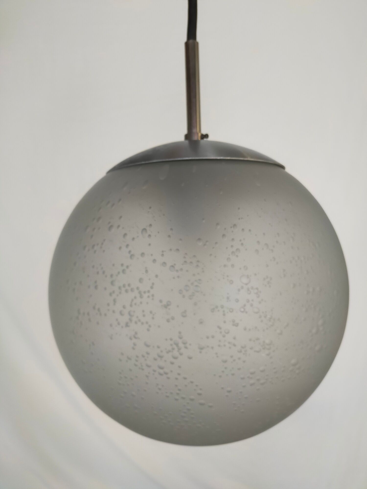 Suspension in blown and sandblasted glass, by Raak, from the 70s