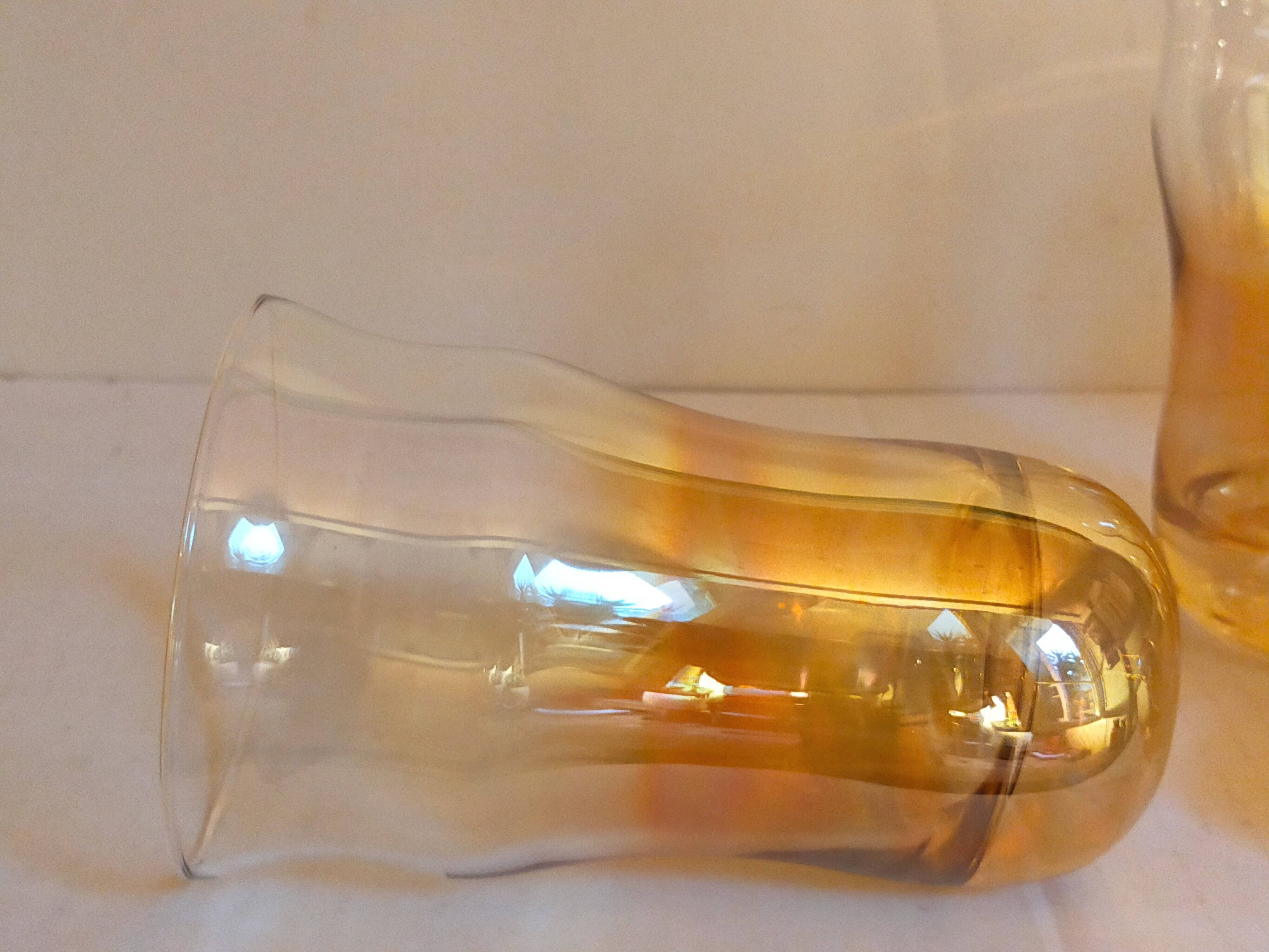 Four iridescent honey blown glass glasses