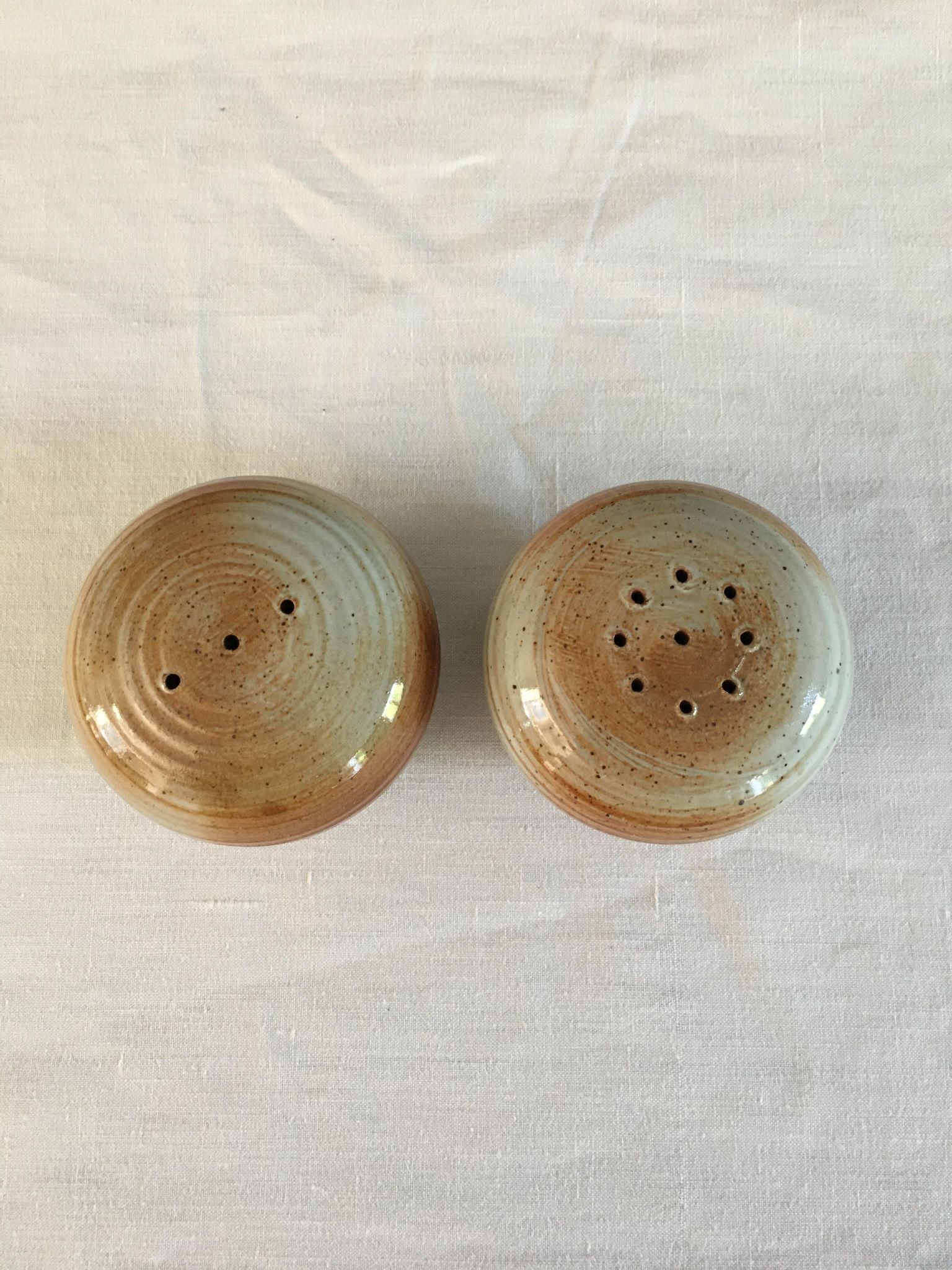 Vintage salt and pepper shaker in sandstone