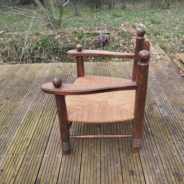 Fauteuil bas paillé de cheminée style Dudouyt