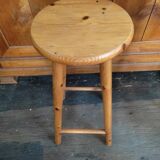 High bar stool in weathered wood round seat