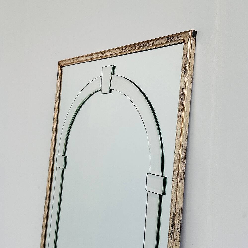 Large Art Deco style beveled wall mirror with architectural arch design
