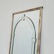 Large Art Deco style beveled wall mirror with architectural arch design