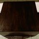 Table basse et 2 tabourets en bois foncé