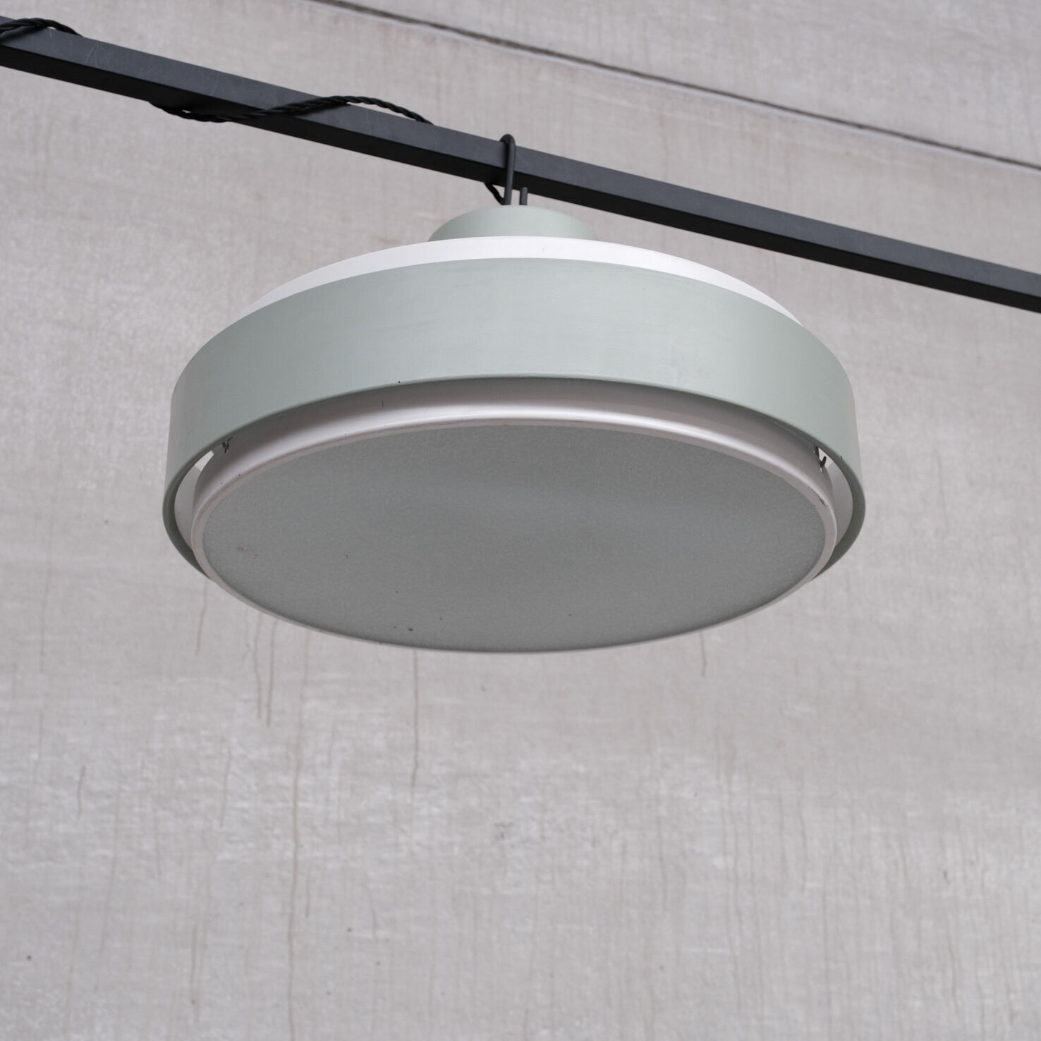 Mid-century steel and glass pendant by RAAK