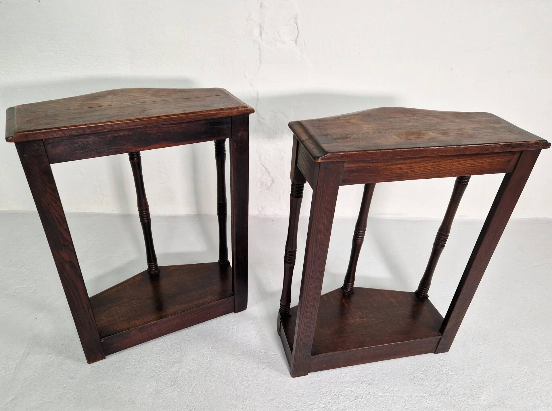 Pair of English 1920s carved oak sidetables