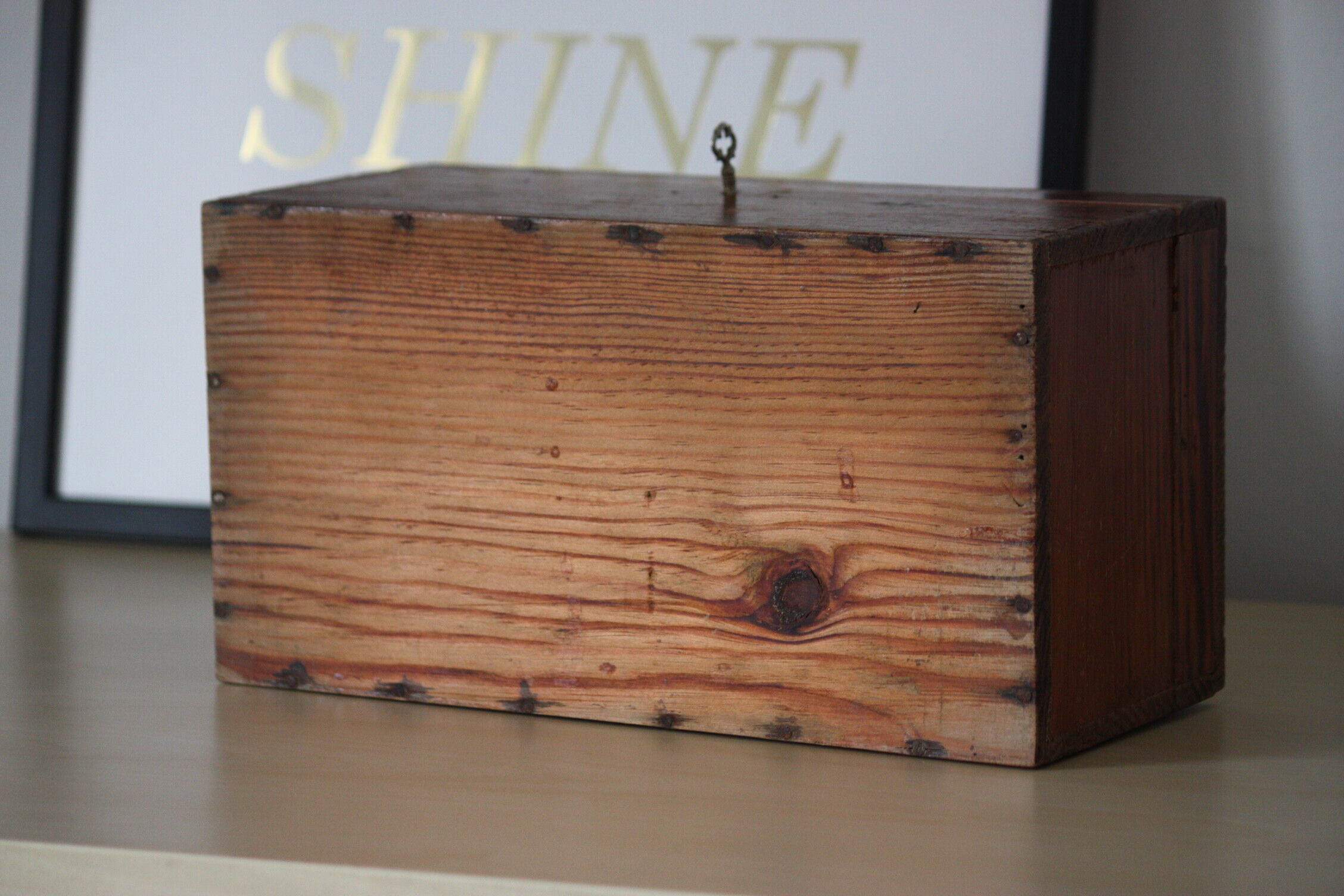 Carved wooden box with lock