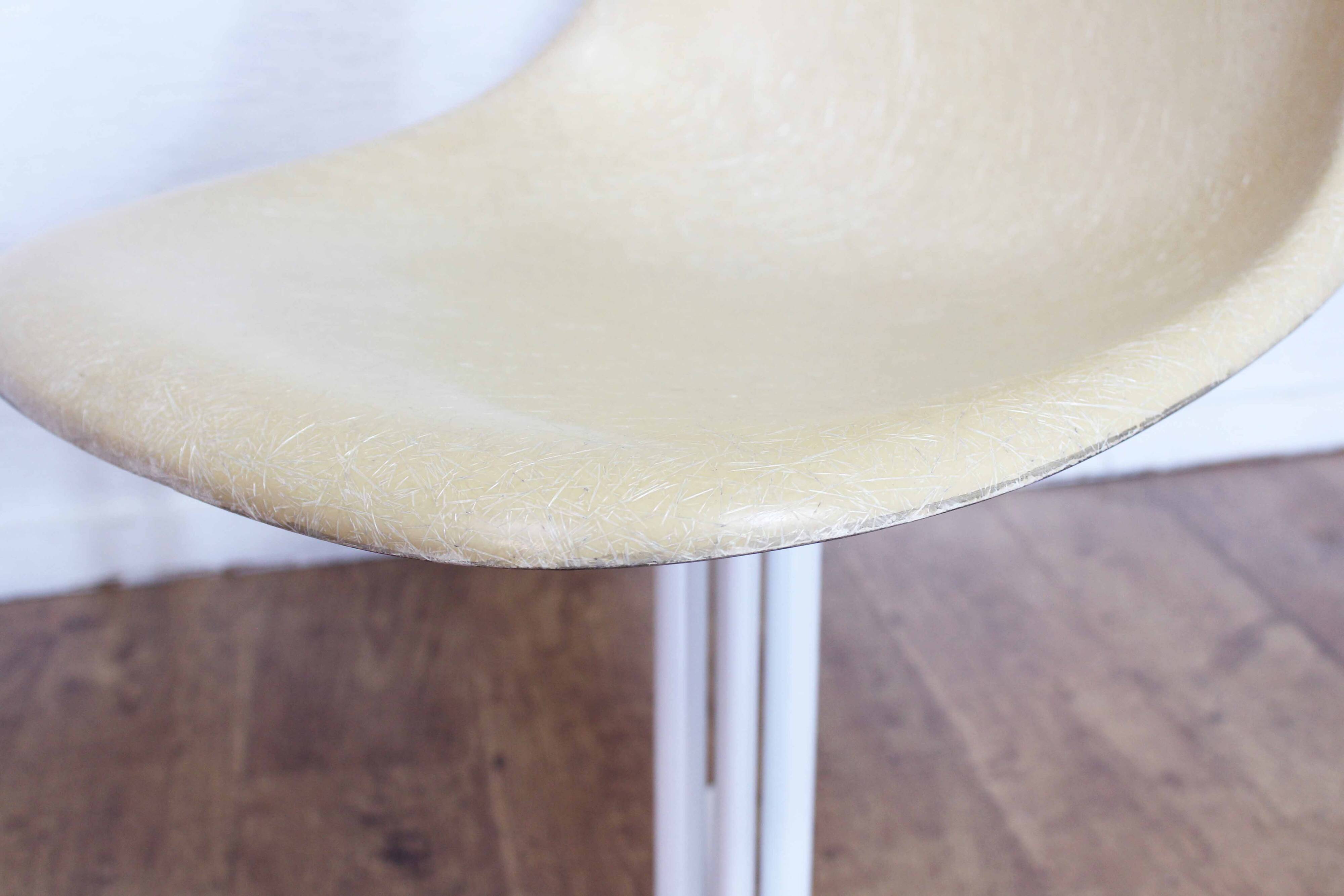 Pair of EAMES La Fonda fiberglass chairs 1970