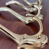 4 golden brass coat racks