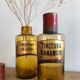 Lots of old brown glass pharmacy jars bottles