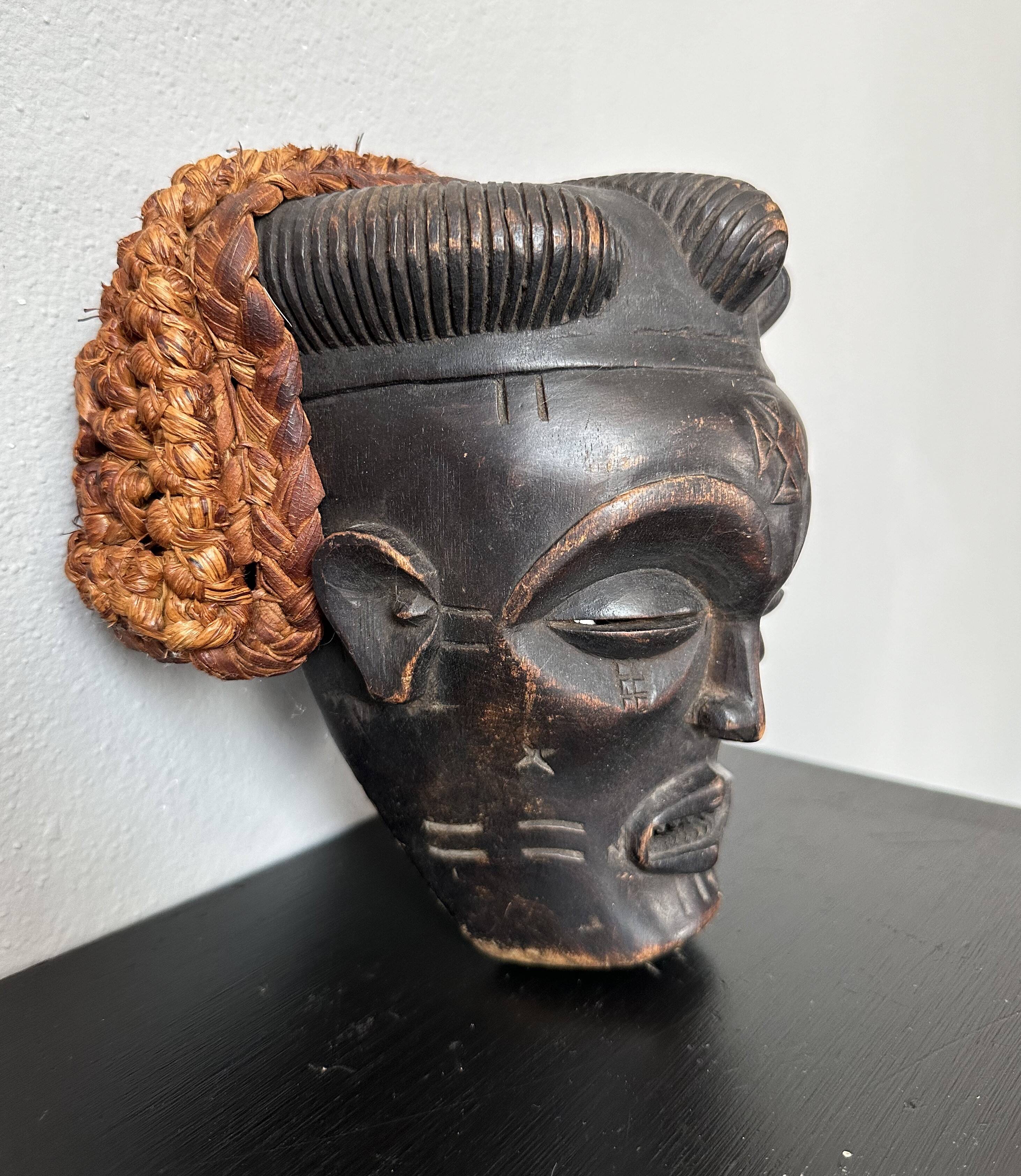 Black and orange tribal mask