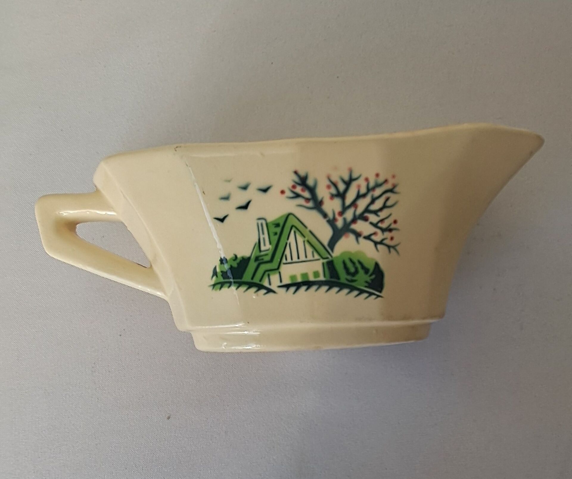 Bayeux model sauce boat from Digoin Sarreguemines. Vintage.