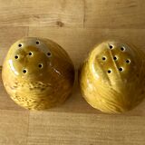 Salt and pepper in saffron yellow ceramic