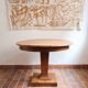 Table ronde en frêne, pied central mouluré, art déco